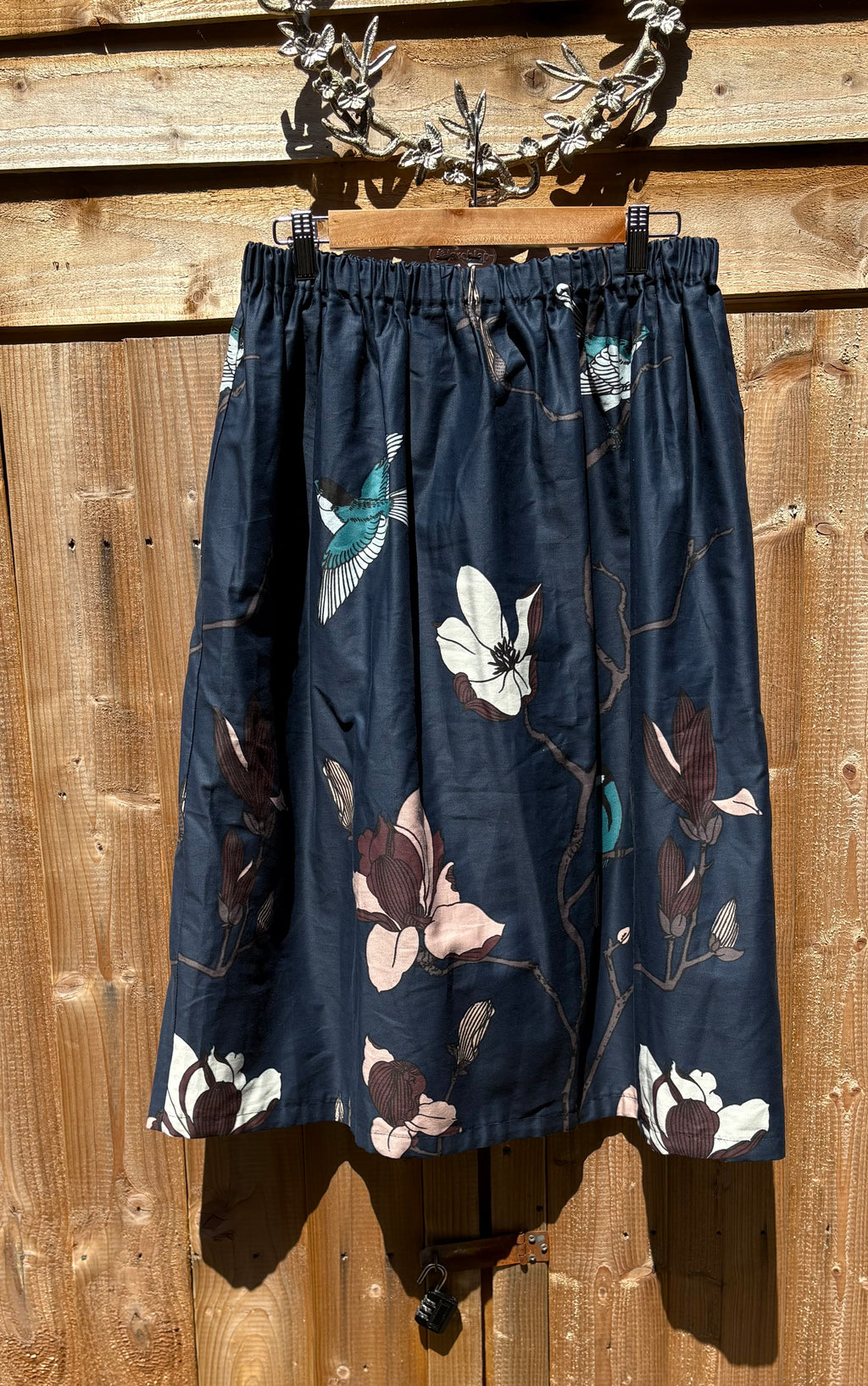 Handmade Ruth skirt in blue with white birds with elasticated wait to fit up to 31ins waist
