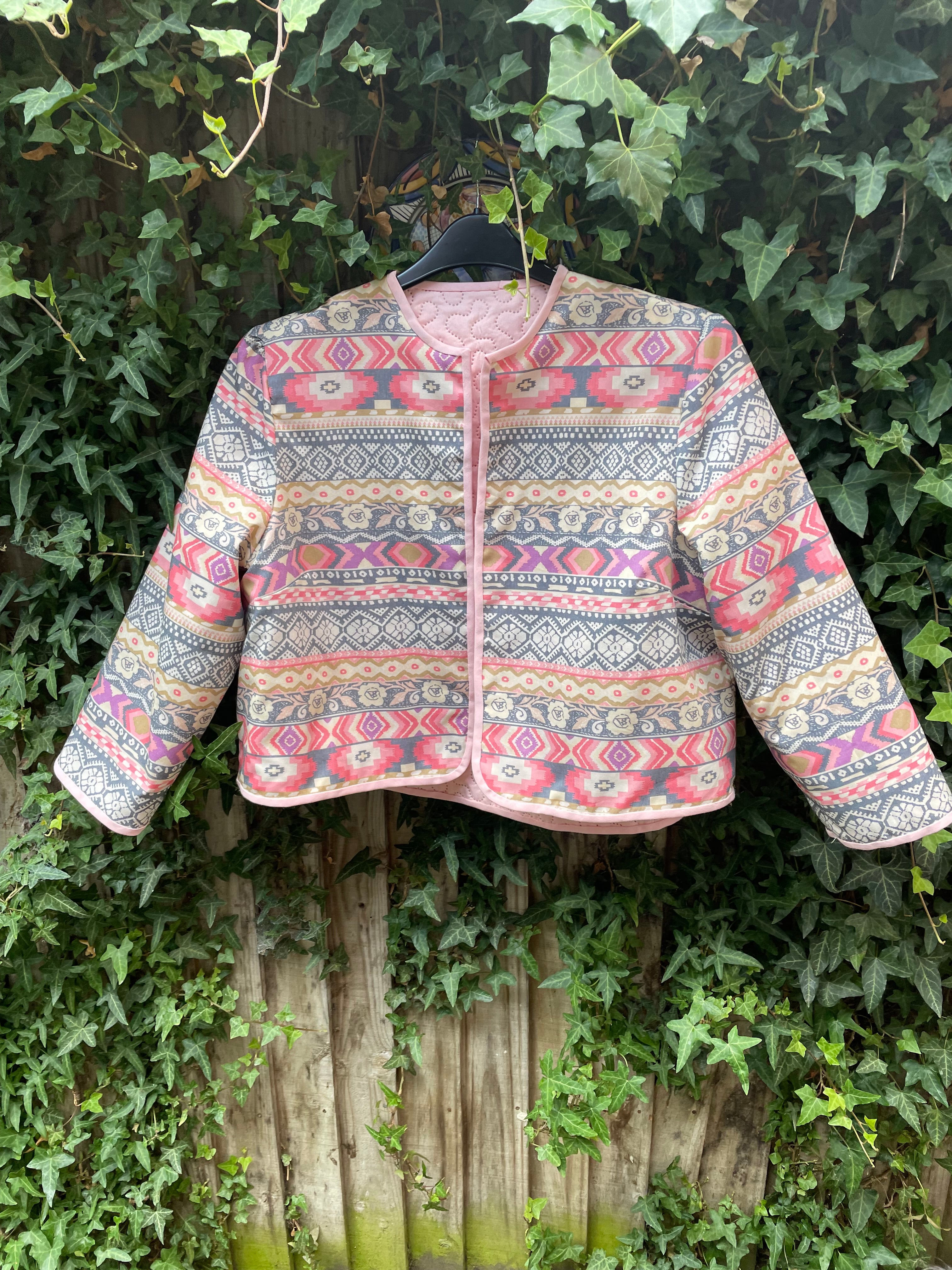 Reversible Beatrice quilted jacket pink one side and aztec cotton the other size 14