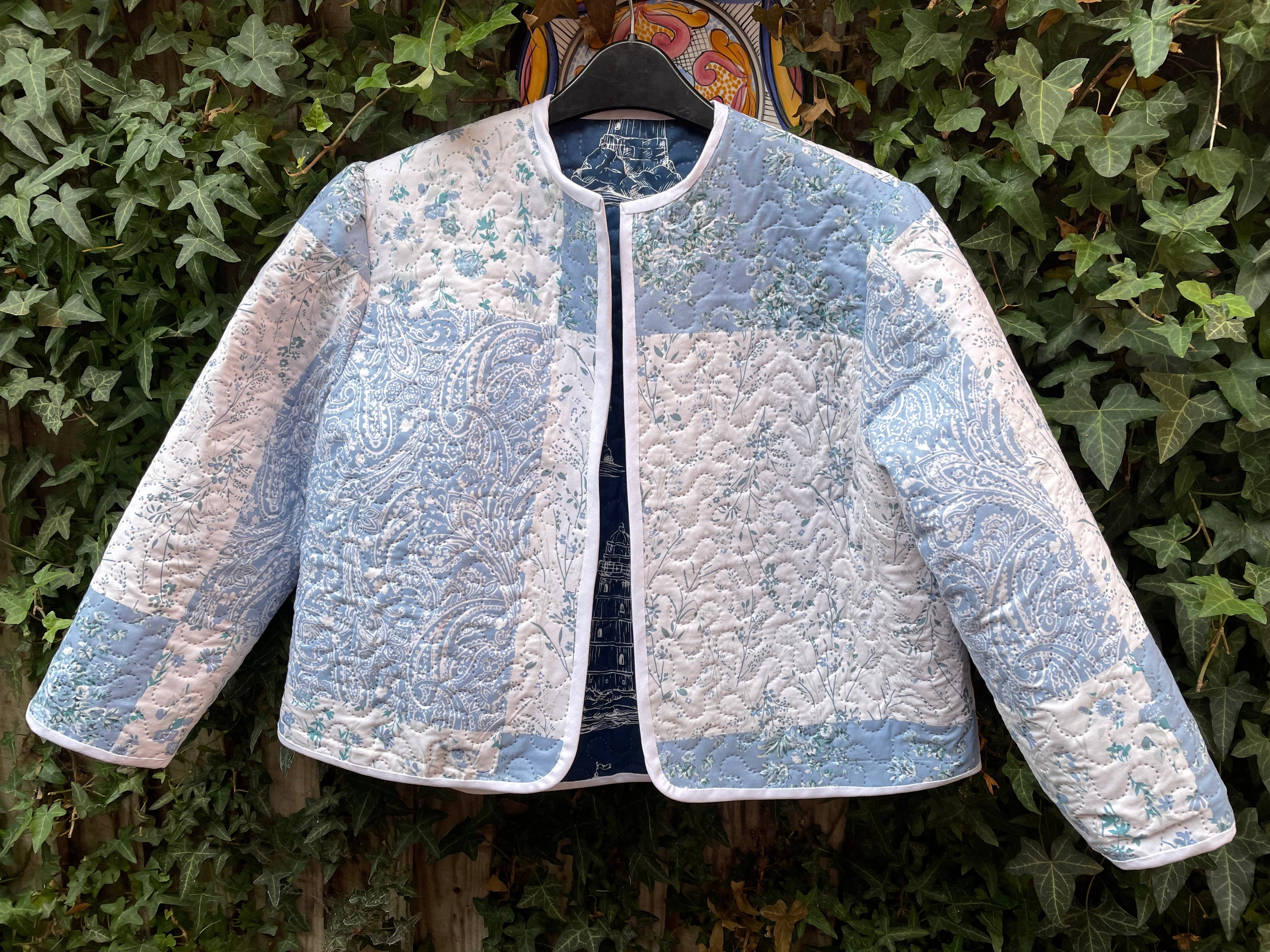 Reversible Beatrice quilted jacket floral one side blue patchwork on other size 18