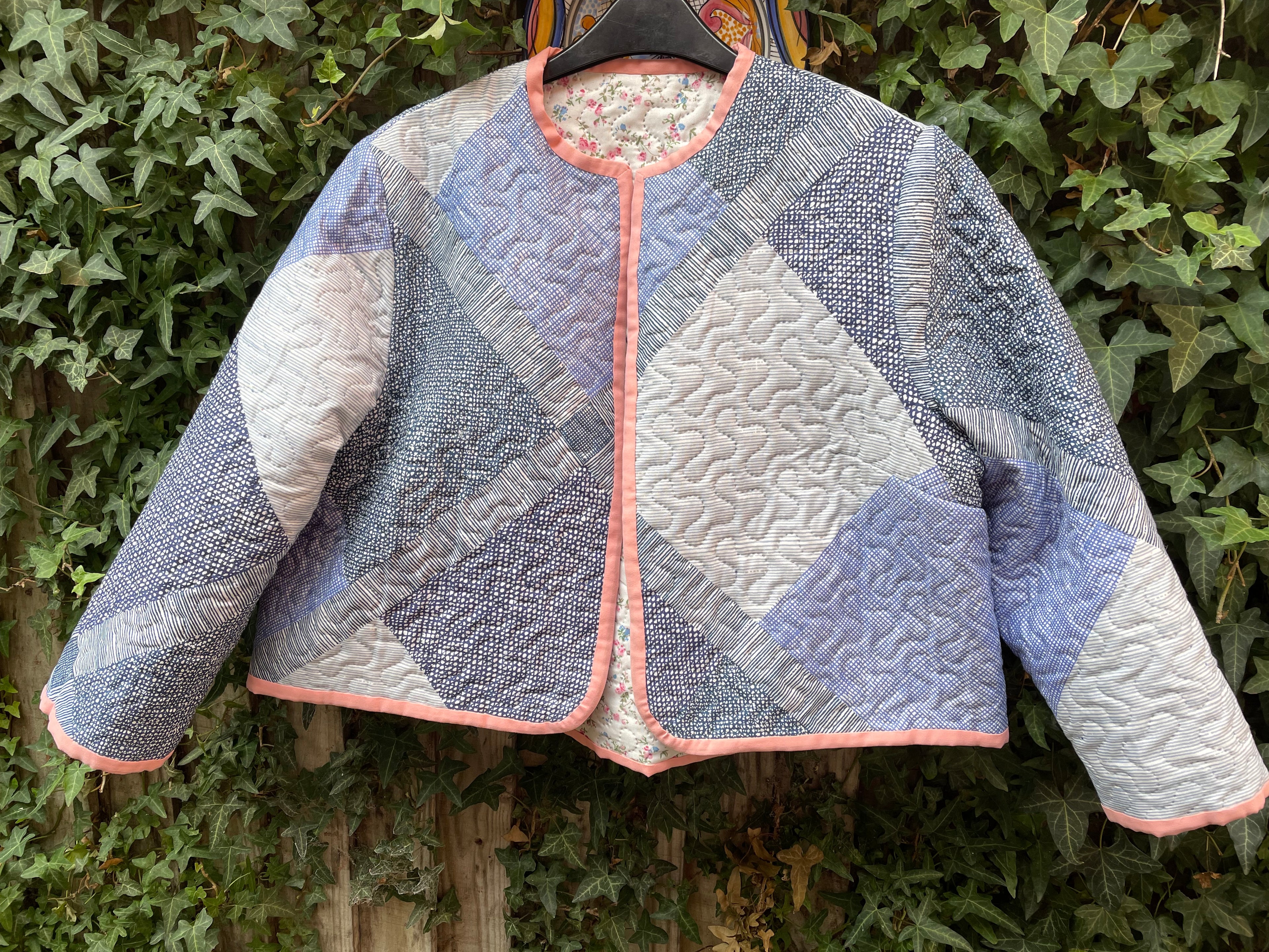 Reversible quilted jacket floral one side blue and white patchwork size 18